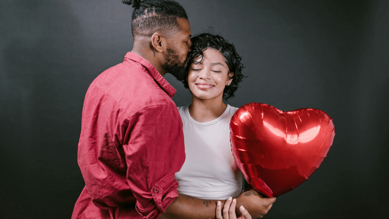 Couple celebrating Valentine at cozy home embracing realistic love and mental health
